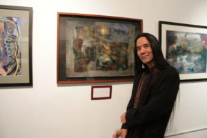 Corey Okada with Examination of a Dream (2013) at The Last Collaboration of Laureen Landau group show reception; Archival Gallery, Sacramento, CA (2013).
