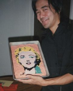 Corey Okada with Warhol Marilyn birthday cake, baked and decorated by Shannon and Brendan (1986).