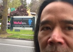 Corey Okada outside the Crocker Art Museum, Sacramento, CA during Andy Warhol: Portraits (2016).